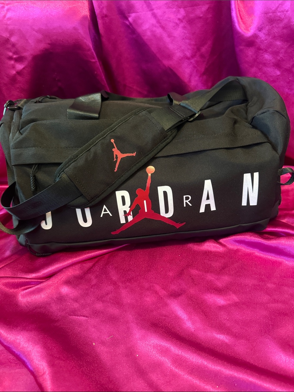 Jordan Black Duffel Bag with Red Logo and White Lettering like new
